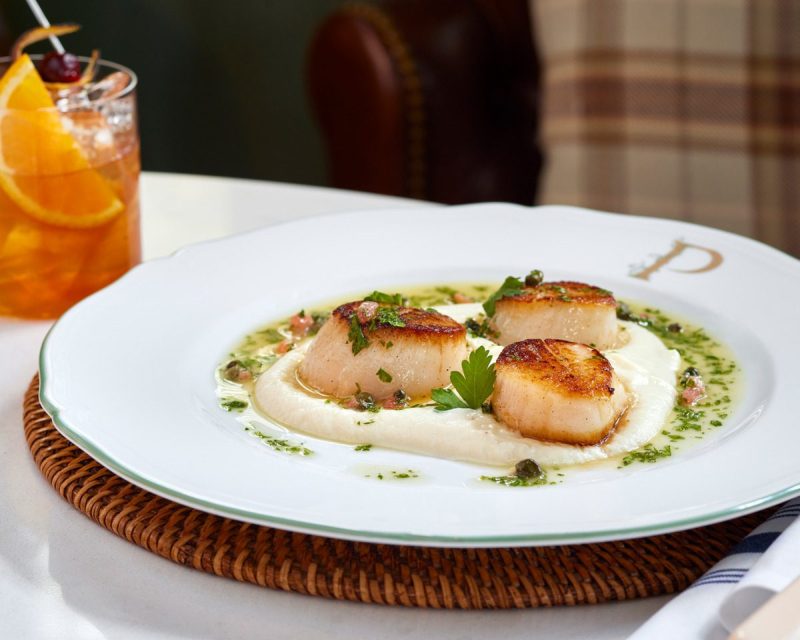 A plate of scallops at The Inn at Little Washington