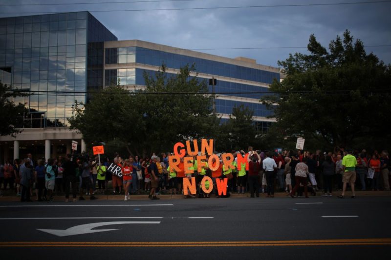 Vigil Held Outside NRA HQ For Mass Shooting Victims In Dayton And El Paso